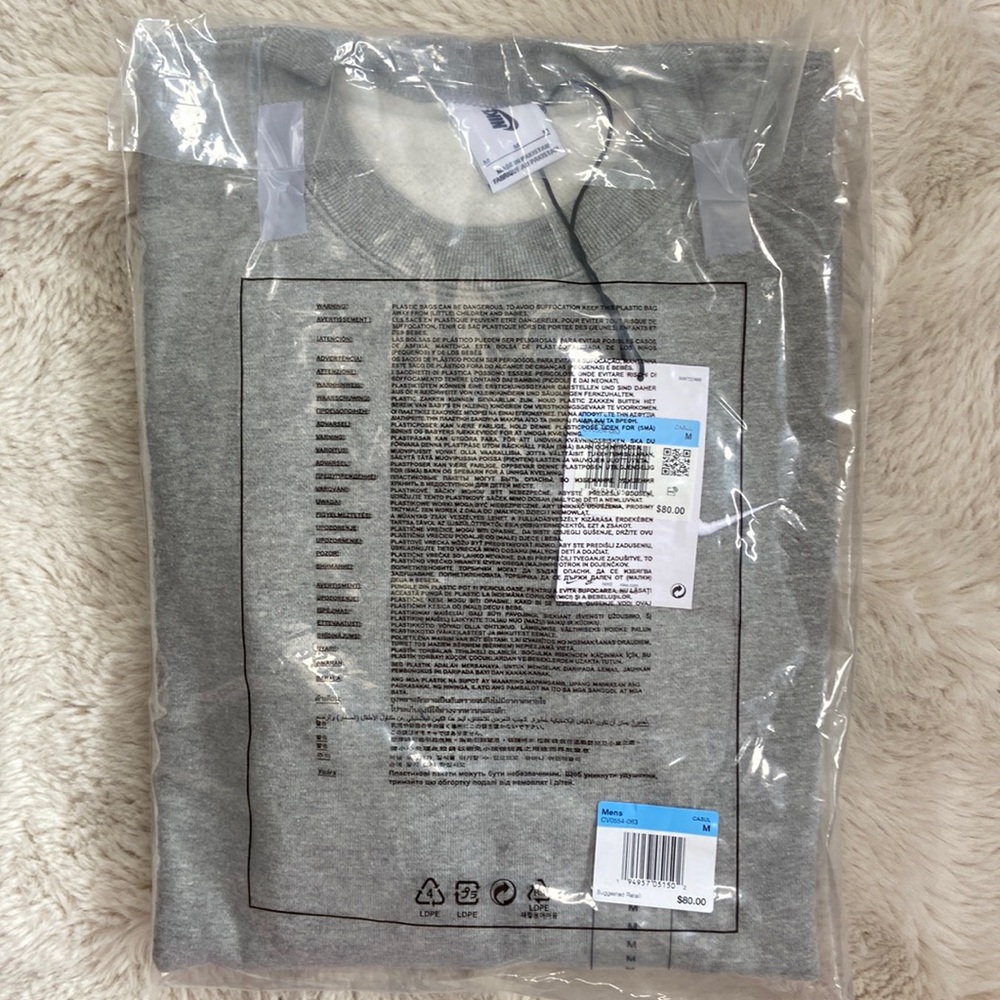 Nike men’s size M gray crew neck sweatshirt. Brand new in bag with tags.
